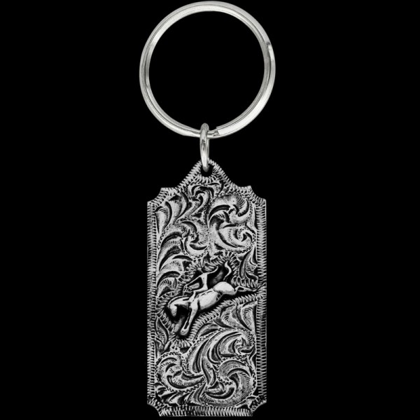 Saddle Bronc Rider, The Saddle Bronc keychain includes beautiful, engraved scrolls, a 3D saddle bronc figure, back engraving, and a key ring attachment. Each silver key c